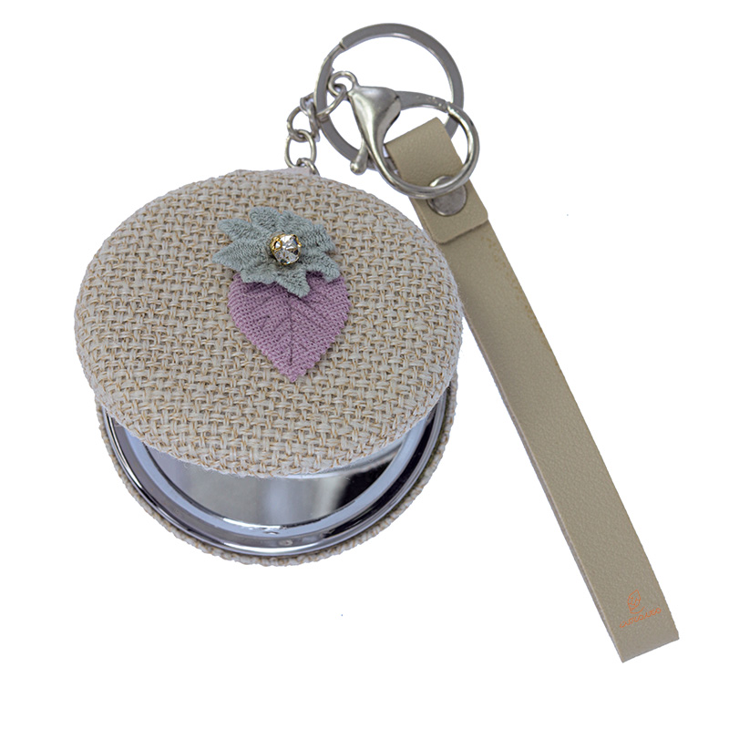 آینه گرد جیبی (آرایشی) فانتزی پارچه ای کرم طرح گل 075 (3)