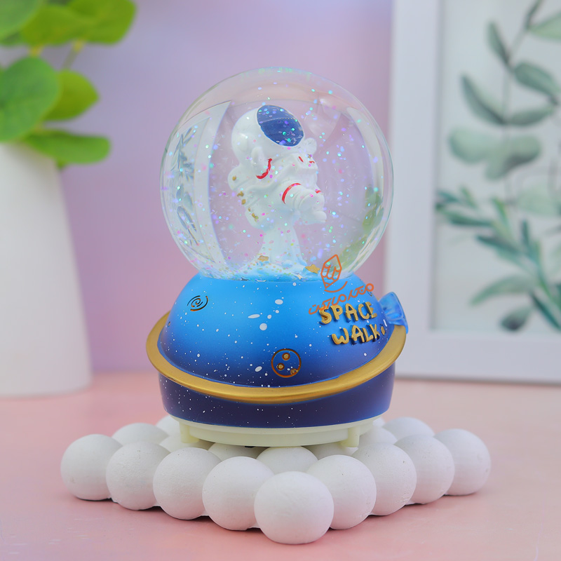 گوی فانتزی موزیکال 12 سانت طرح فضانورد G4324 (1).jpg